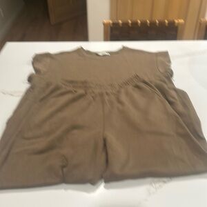 Olive green pjs/sweats top and bottom.  Medium on both. Used but good condition.